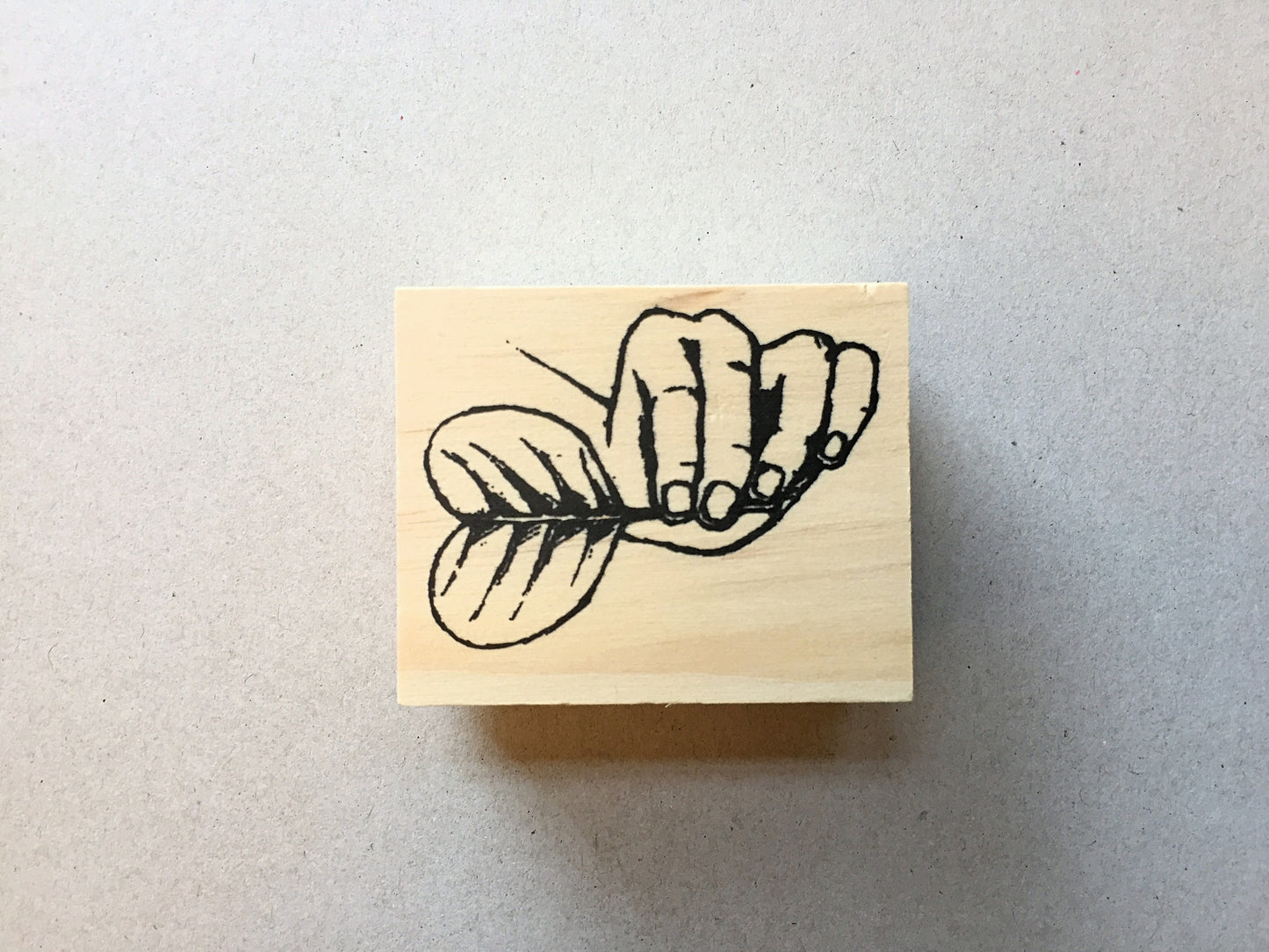 Yusworld - hand with leaf rubber stamp [Pre-loved]