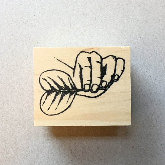 Yusworld - hand with leaf rubber stamp [Pre-loved]
