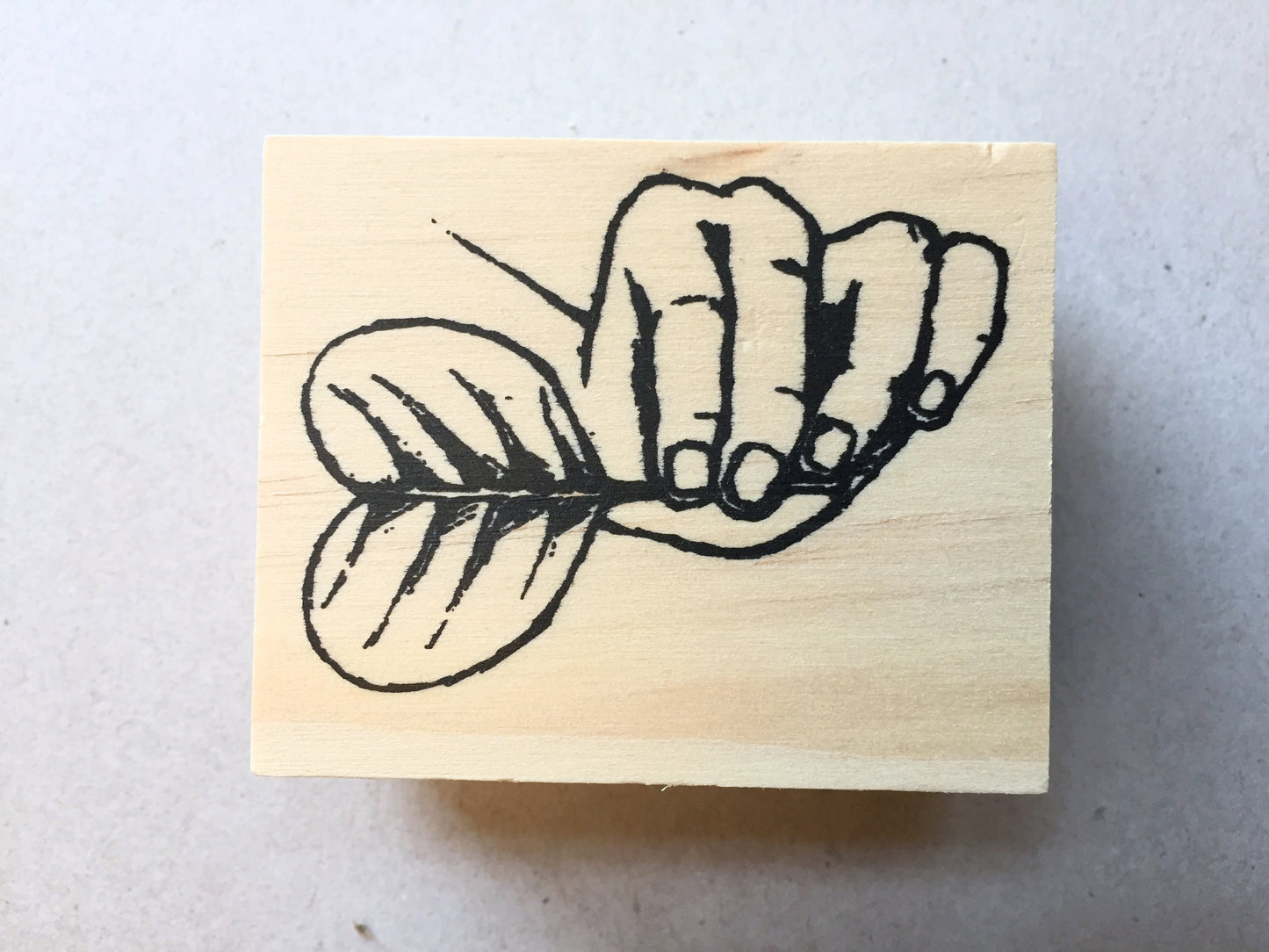 Yusworld - hand with leaf rubber stamp [Pre-loved]