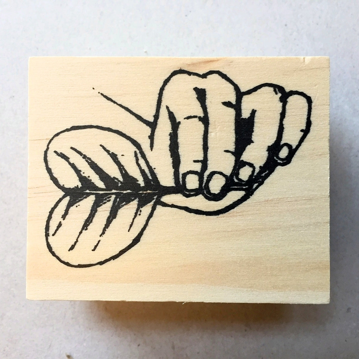 Yusworld - hand with leaf rubber stamp [Pre-loved]